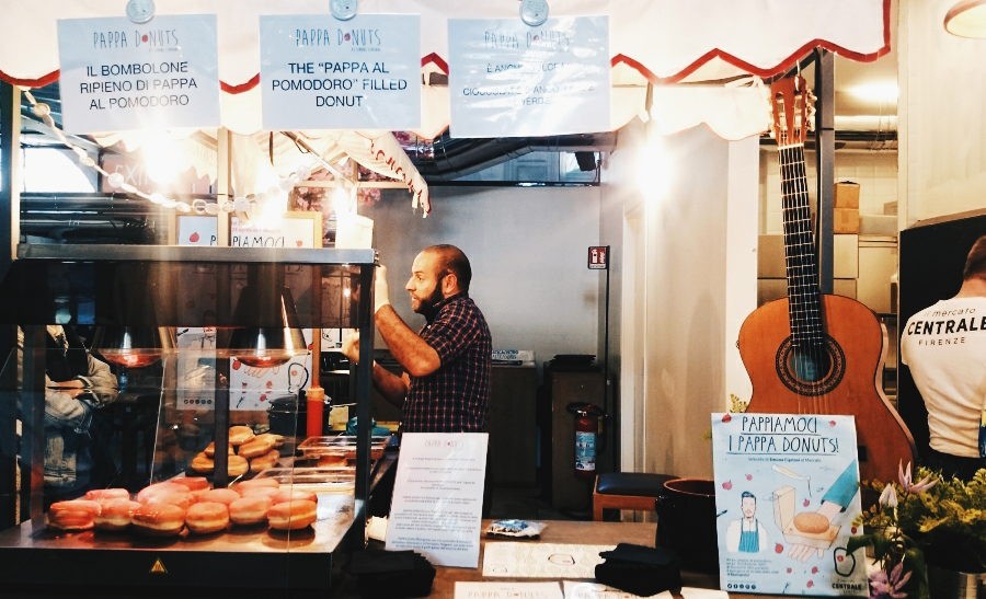 Man speaking at Mercato Centrale in Florence