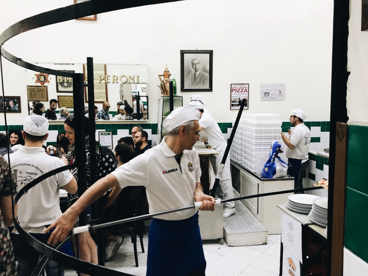 Preparing pizza in L'antica Pizzeria da Michele